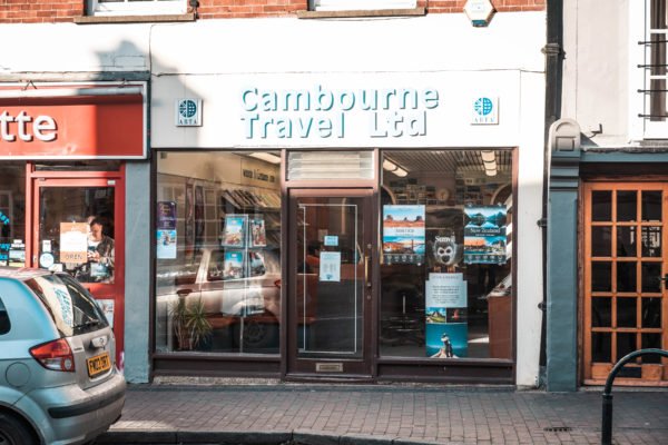 Shop front for Cambourne Travel in Newport Pagnell High Street