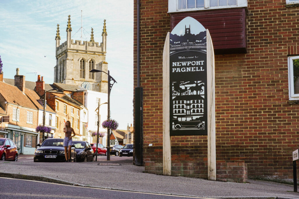 Newport Pagnell Gateway sign representing coaching